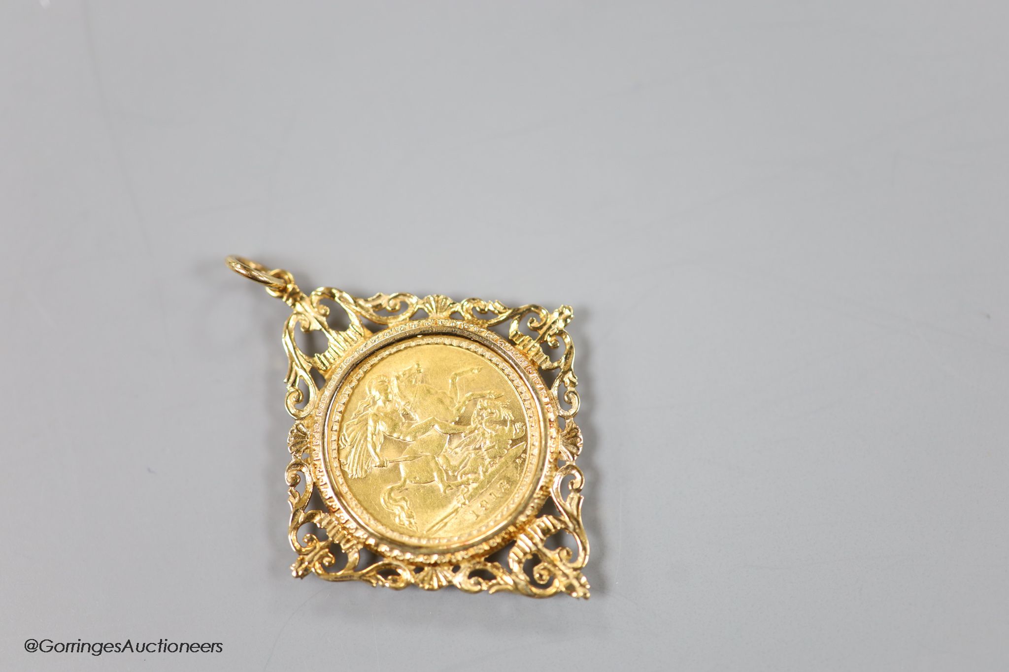 A George V 1912 gold sovereign, in a modern 9ct gold pendant mount, gross 10.4 grams.